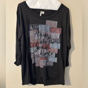 Quarter length sleeve graphic Tee